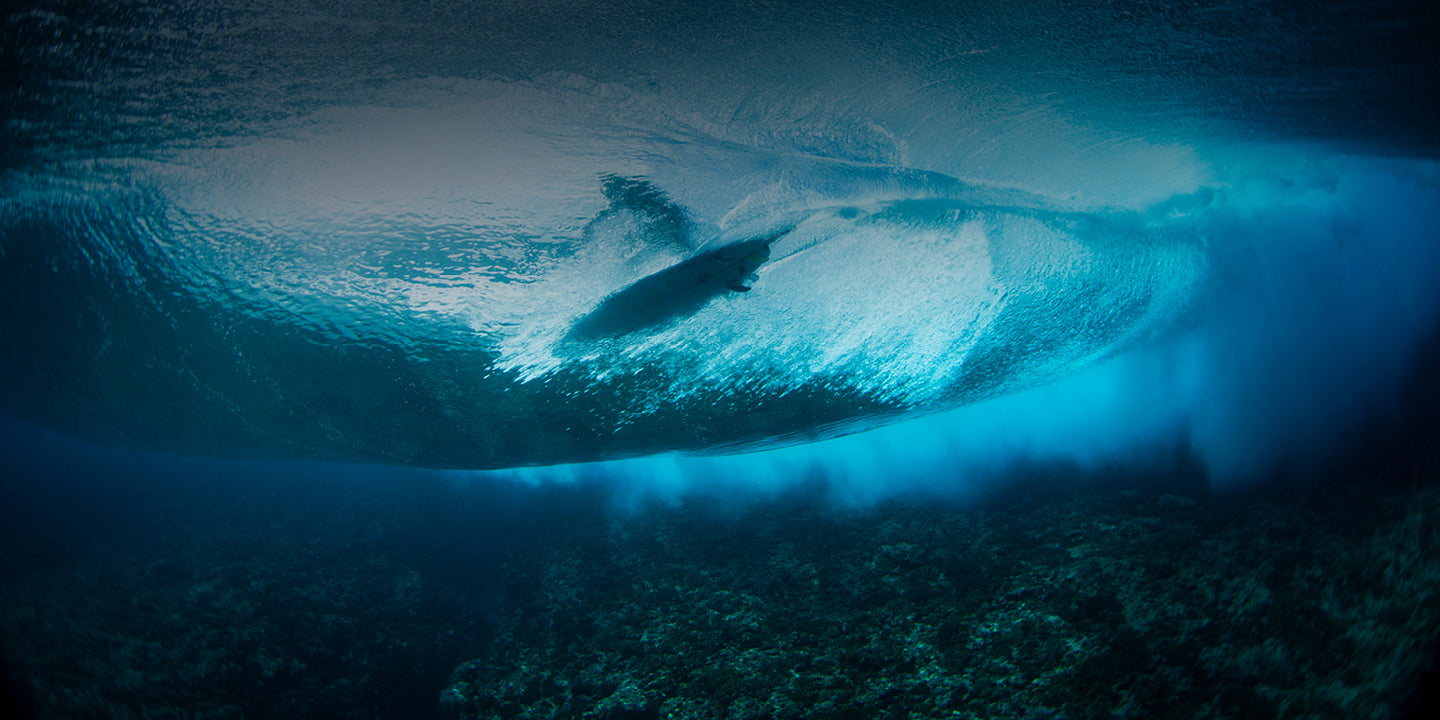 Underwater view of a large wave.